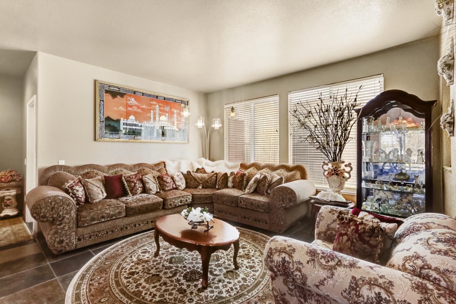 9820 Spring View Way Elk Grove, CA 95757 - Photo 10 of 49 a living room with furniture and a large window
