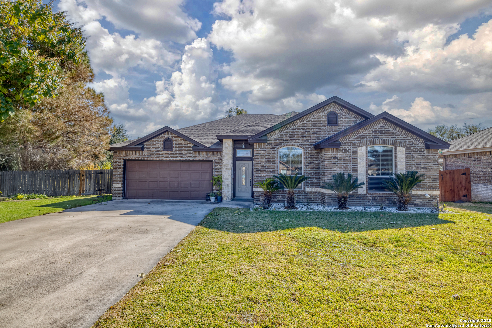 3 Briar Court Uvalde, TX 78801 - Photo 3 of 27 a view of a house with swimming pool and sitting area
