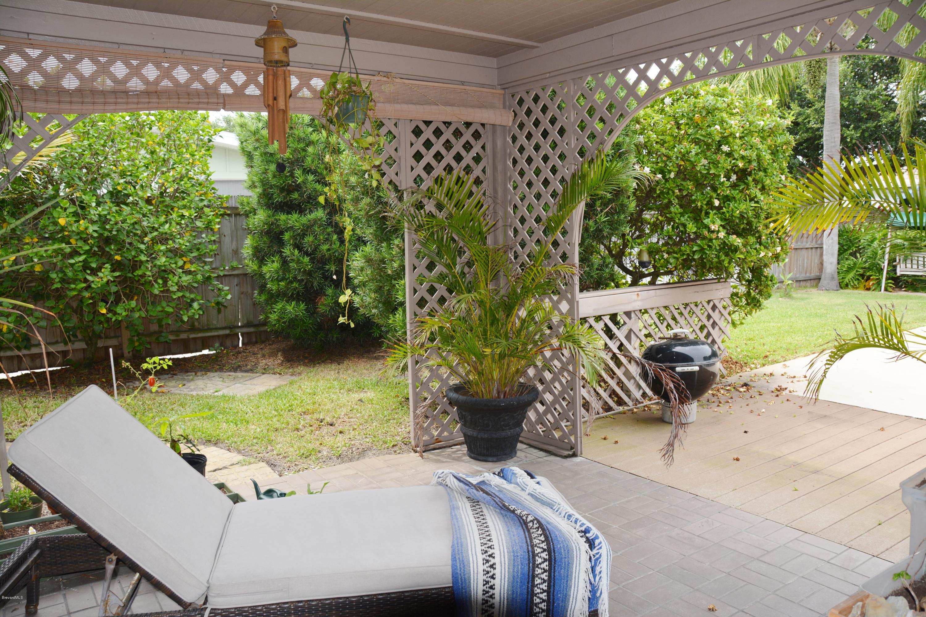 148 Sand Pine Road Indialantic, FL 32903 - Photo 12 of 46 PRIVATE SITTING AREA OFF MASTER