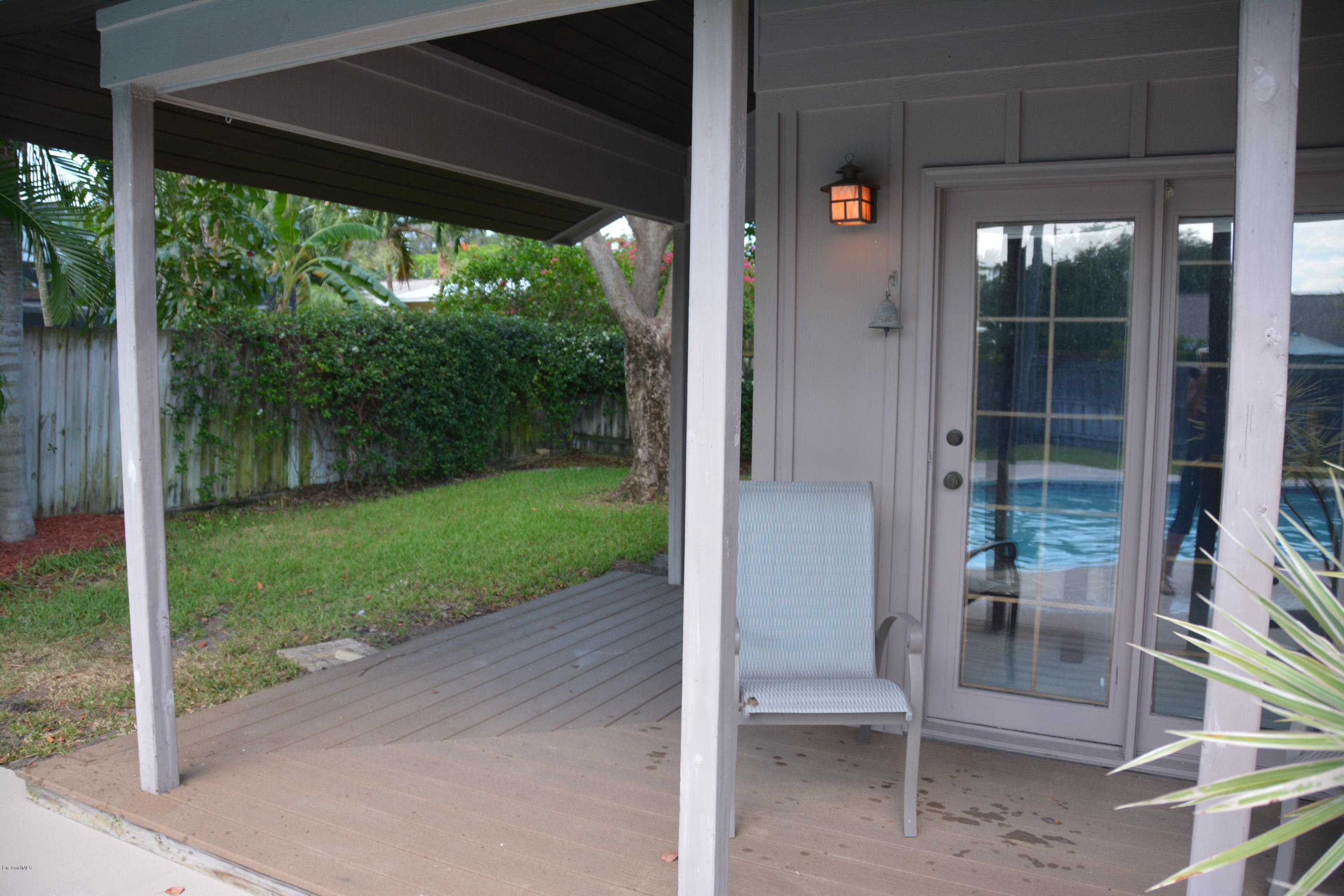 148 Sand Pine Road Indialantic, FL 32903 - Photo 19 of 46 Door and Deck off 3rd bedroom