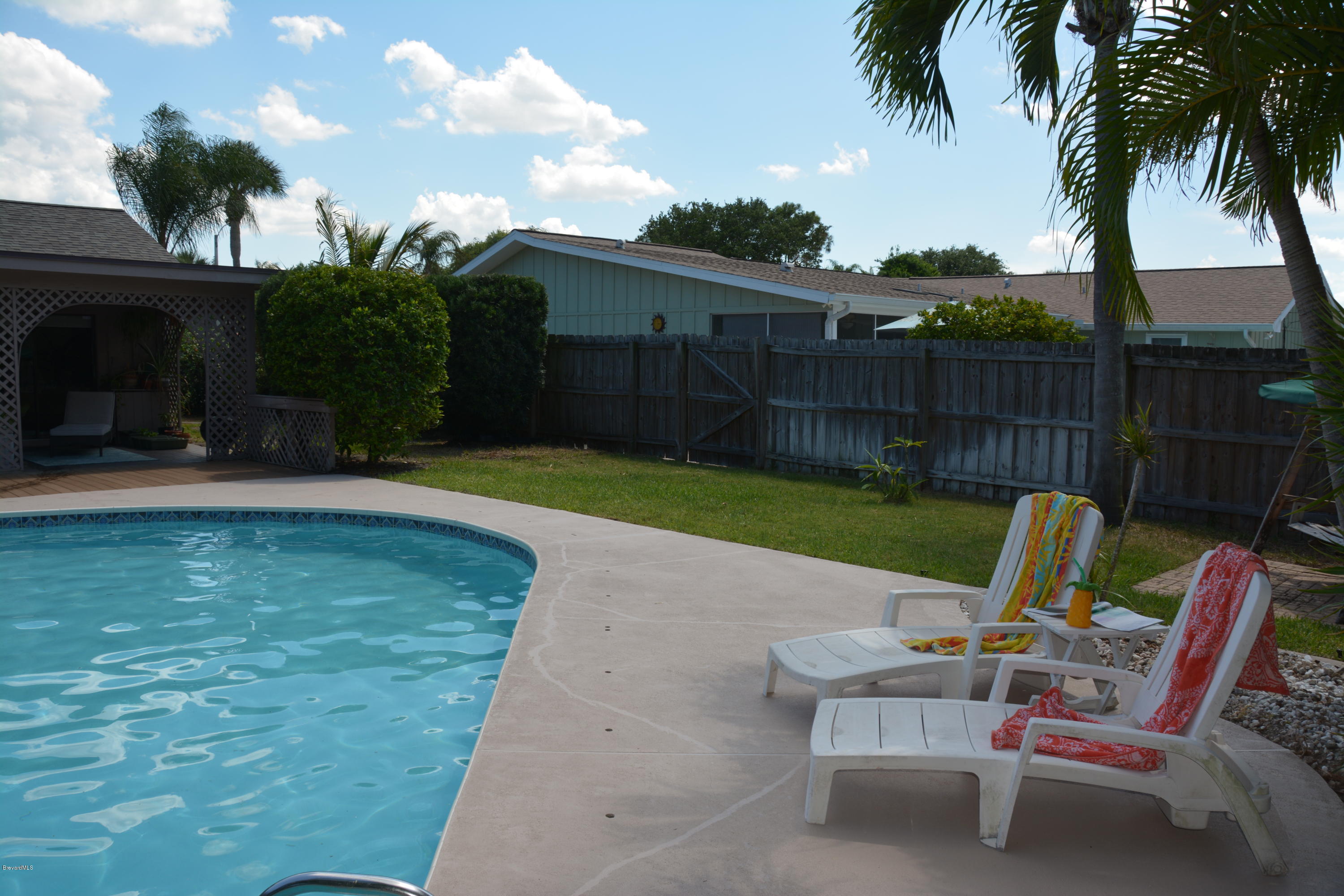 148 Sand Pine Road Indialantic, FL 32903 - Photo 25 of 46 yard looking southwest