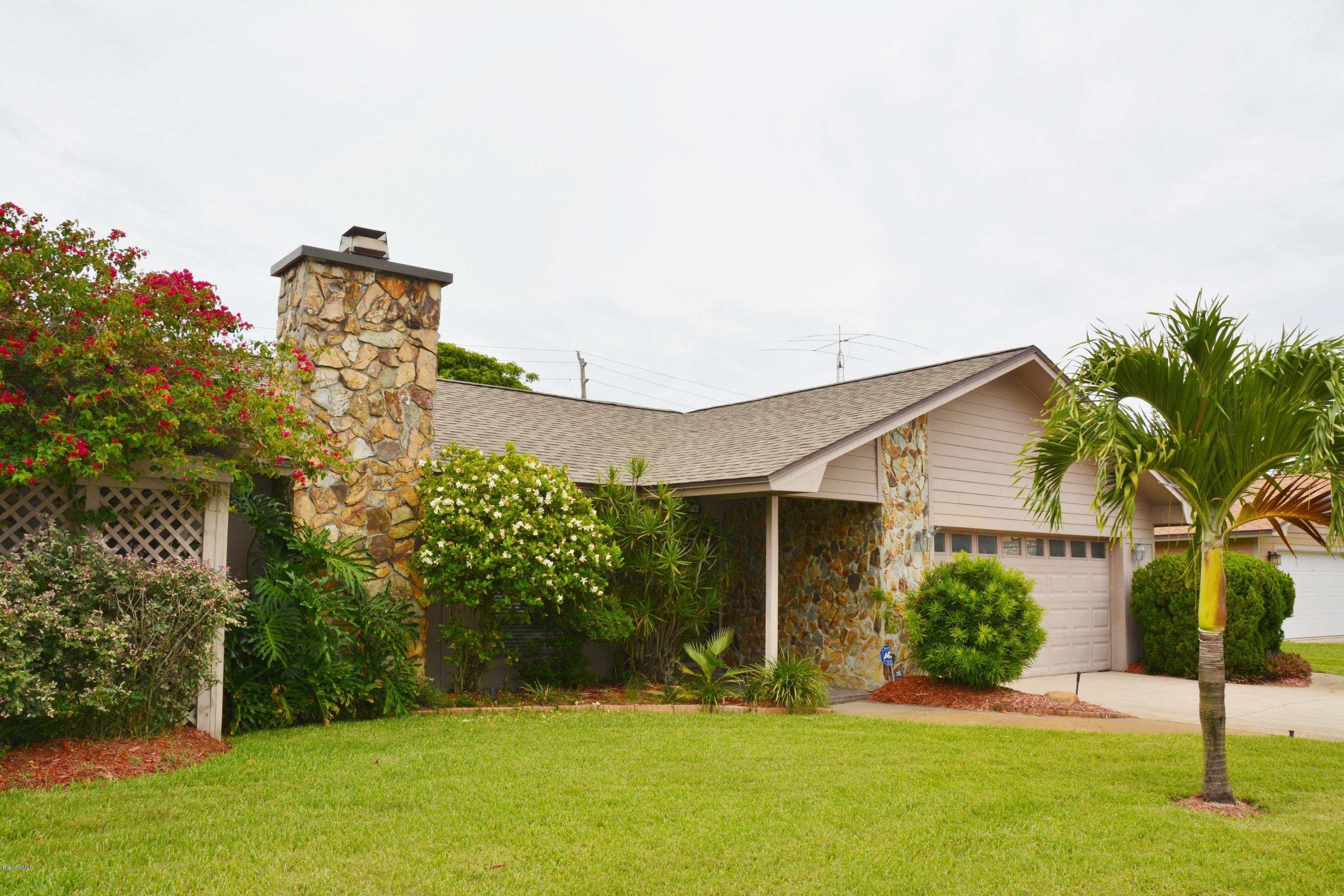 148 Sand Pine Road Indialantic, FL 32903 - Photo 32 of 46 148 SAND PINE - STONE FIREPLACE