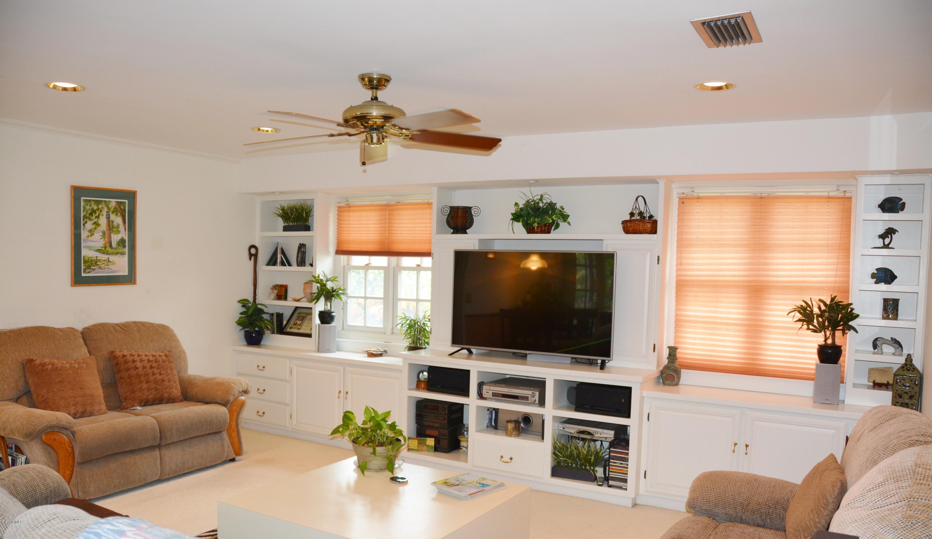 148 Sand Pine Road Indialantic, FL 32903 - Photo 5 of 46 Family time fun by the TV