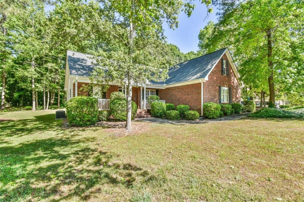 490 Brickleberry Ridge Athens, GA 30605 - Photo 1 of 1 a house with trees in front of it