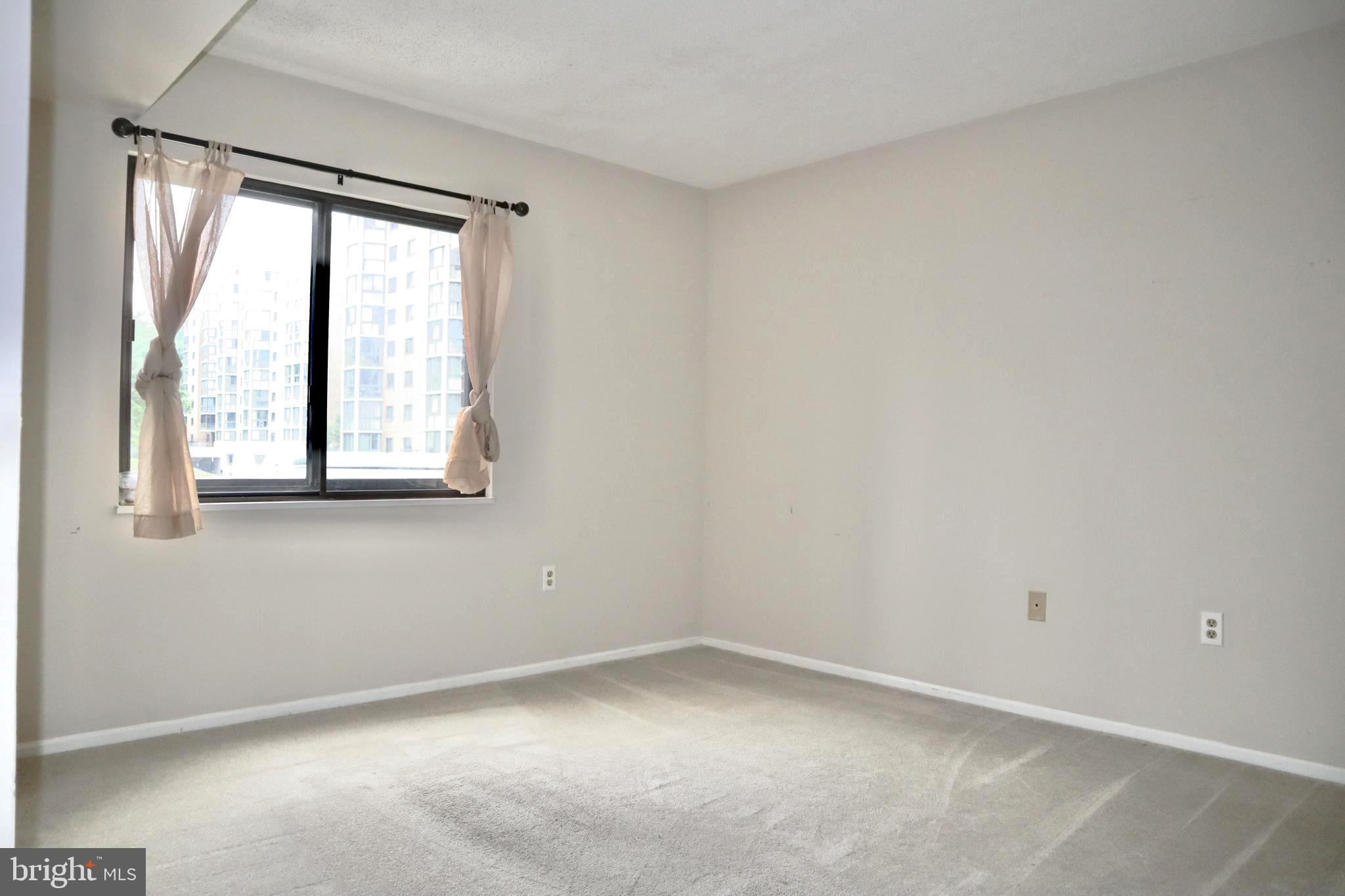 15107 Interlachen Drive, Unit 2119 Silver Spring, MD 20906 - Photo 19 of 53 an empty room with a window