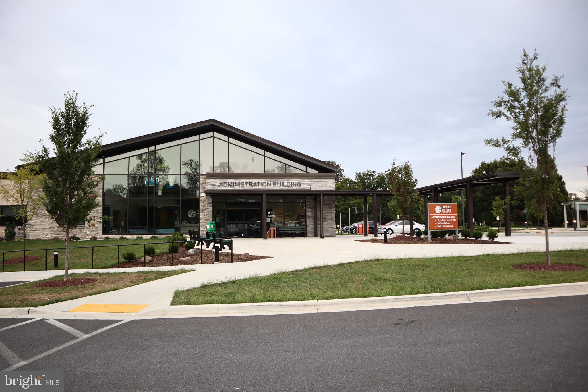 15107 Interlachen Drive, Unit 2119 Silver Spring, MD 20906 - Photo 3 of 53 a front view of house with yard and green space