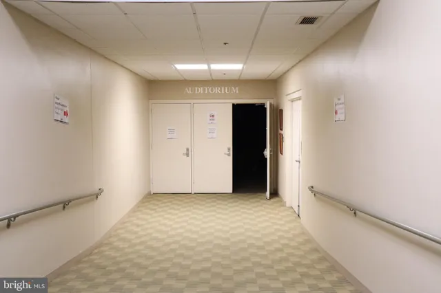 a black and white photo of a living room