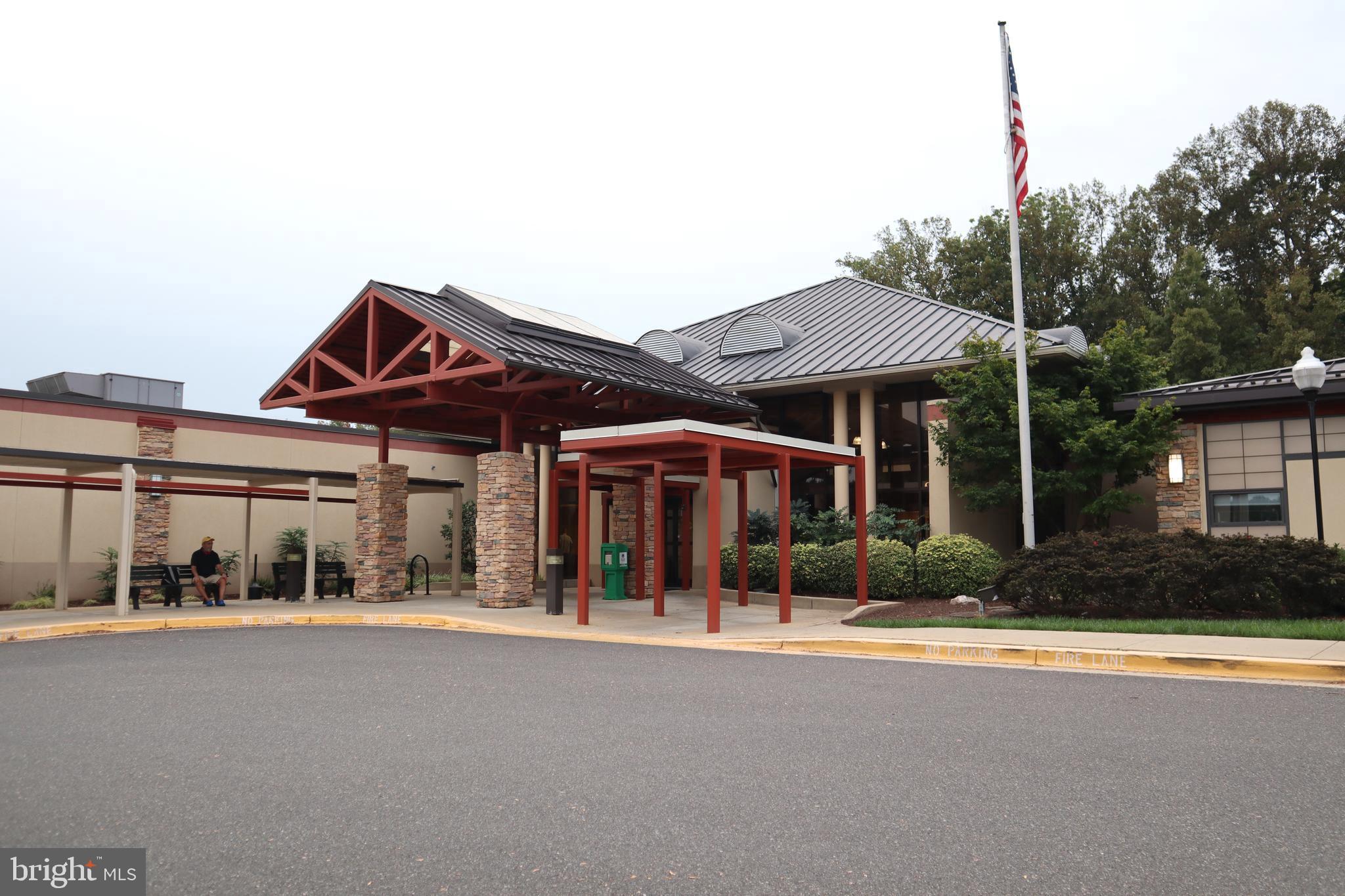 15107 Interlachen Drive, Unit 2119 Silver Spring, MD 20906 - Photo 36 of 53 a front view of house with yard