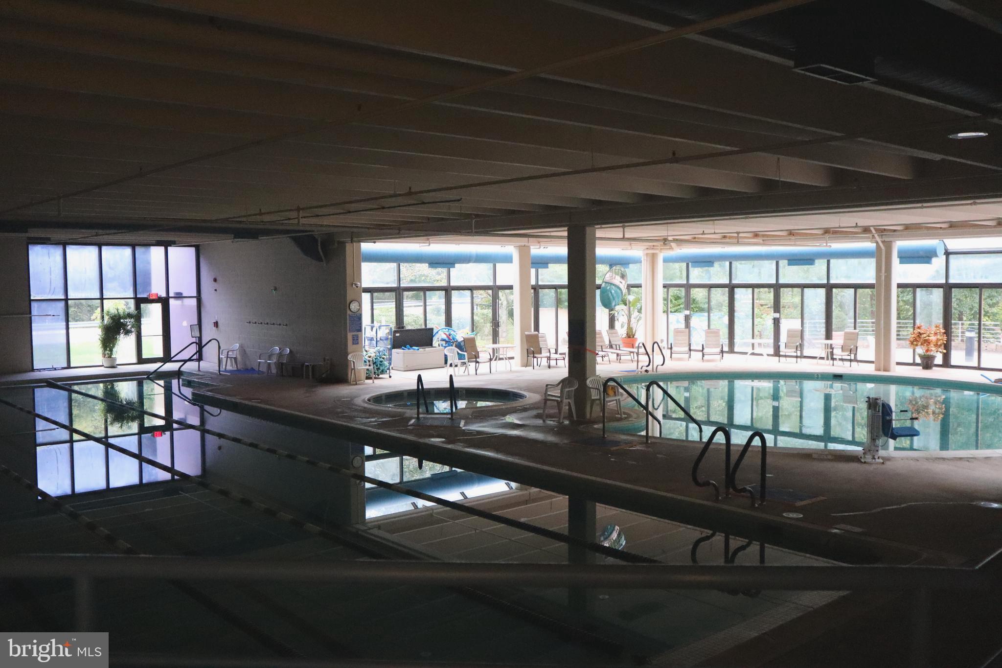 15107 Interlachen Drive, Unit 2119 Silver Spring, MD 20906 - Photo 47 of 53 a dining room with furniture