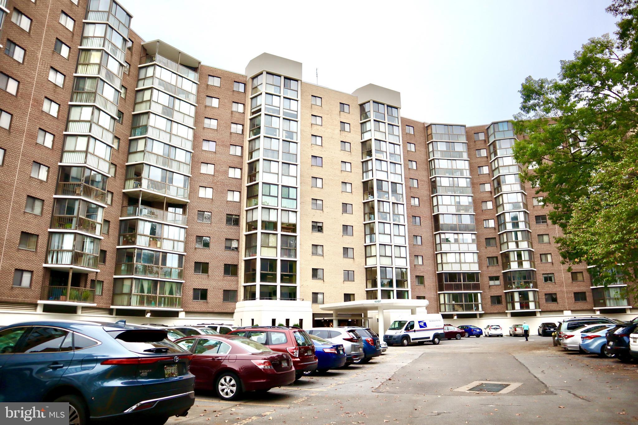 15107 Interlachen Drive, Unit 2119 Silver Spring, MD 20906 - Photo 5 of 53 a buildings with car parked in front of it