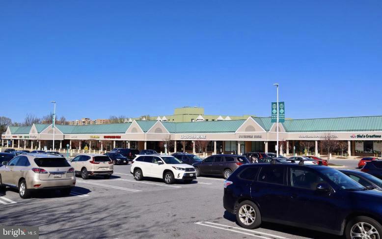 15107 Interlachen Drive, Unit 2119 Silver Spring, MD 20906 - Photo 52 of 53 a car parked in front of a house