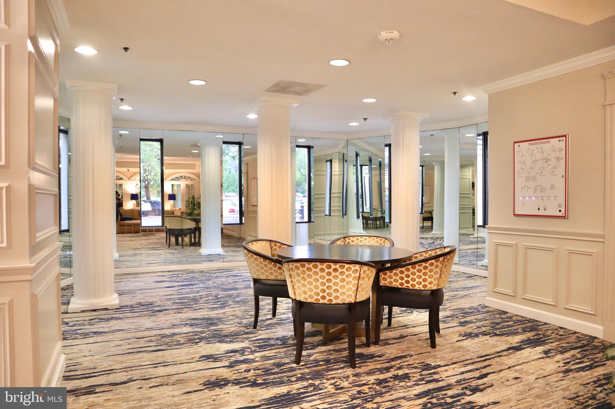 15107 Interlachen Drive, Unit 2119 Silver Spring, MD 20906 - Photo 8 of 53 a dining room with furniture and window