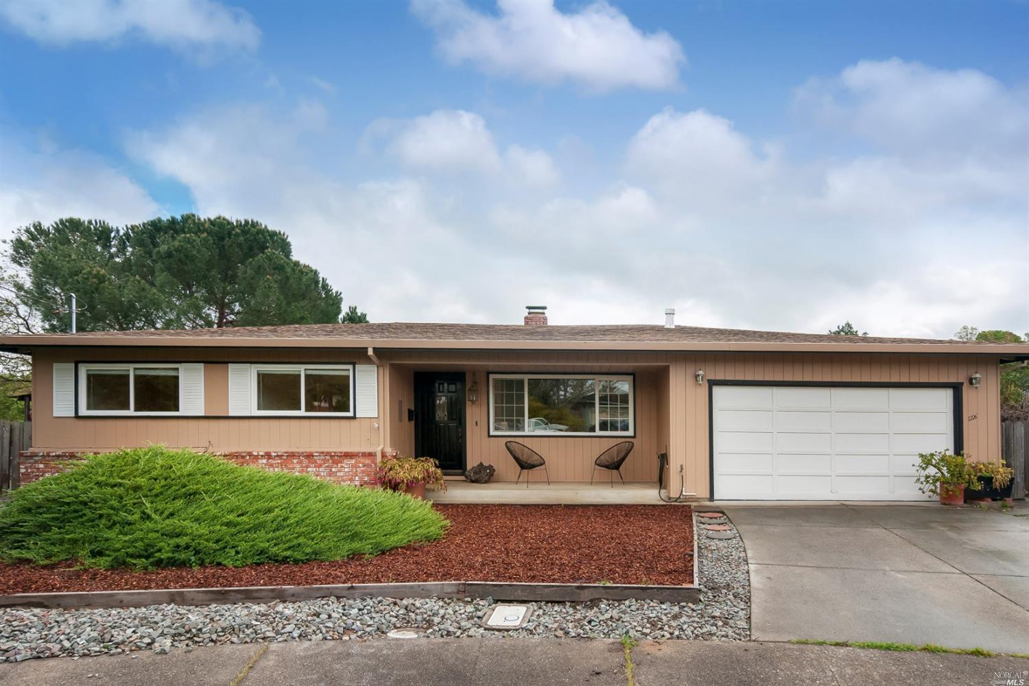 1226 Ridgeview Court Novato, CA 94947 - Photo 1 of 1 a front view of a house with garden