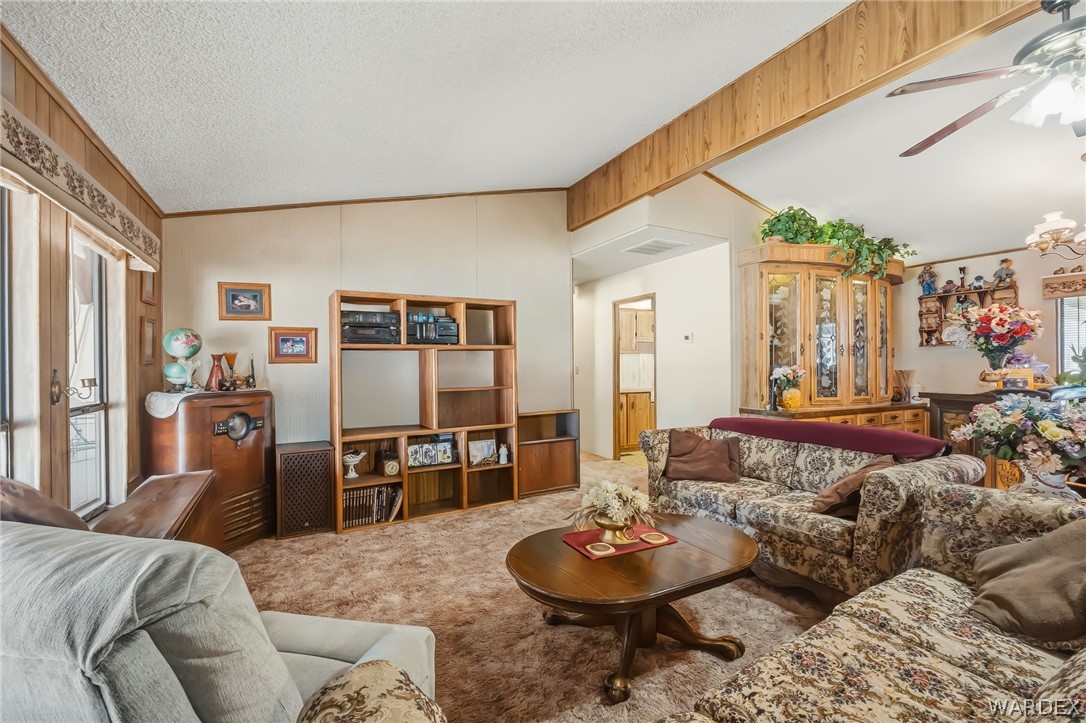 10031 Dike Road Mohave Valley, AZ 86440 - Photo 50 of 78 a living room with furniture and wooden floor