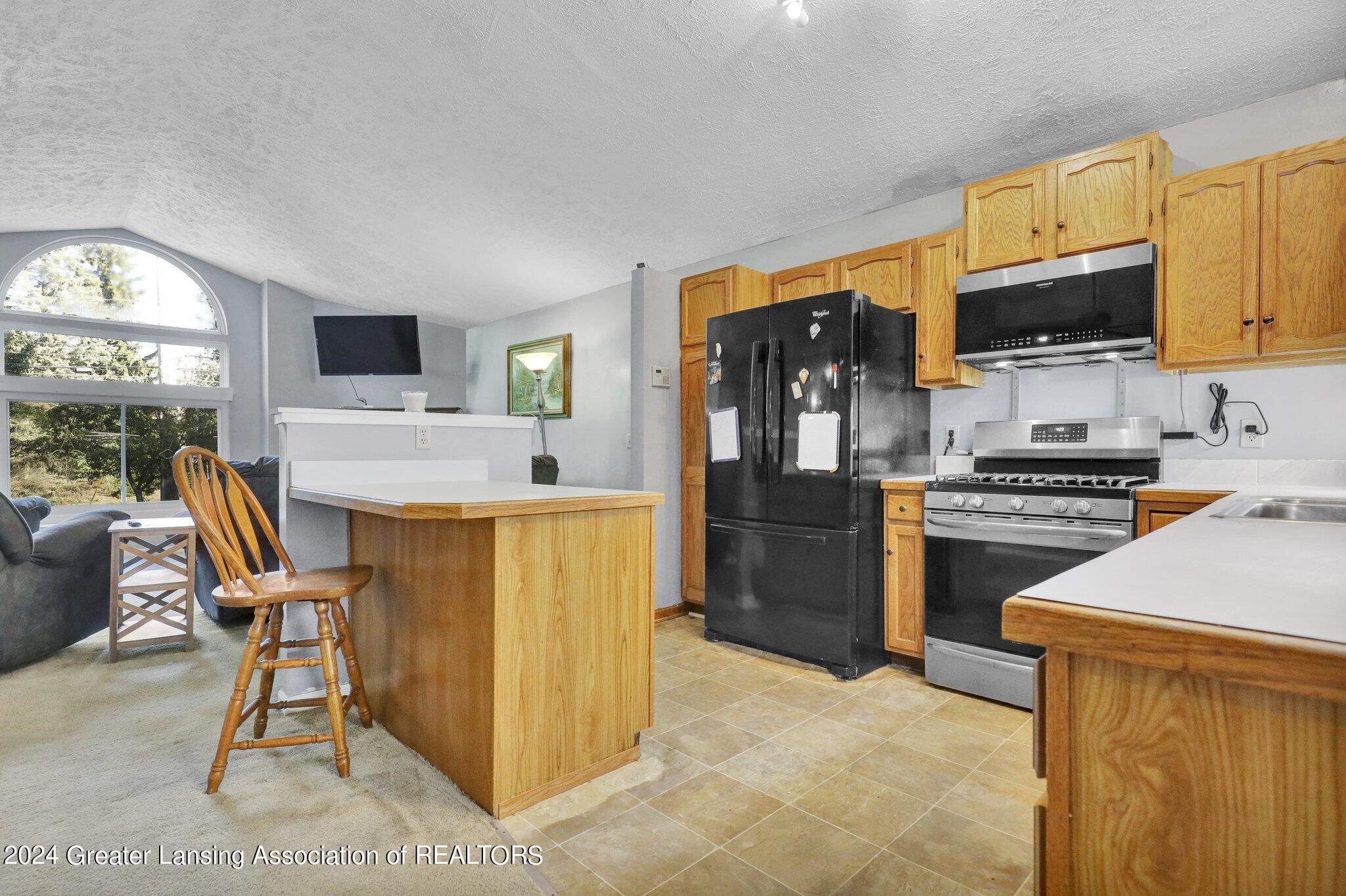 3606 North Aurelius Road Lansing, MI 48910 - Photo 9 of 33 3.1
