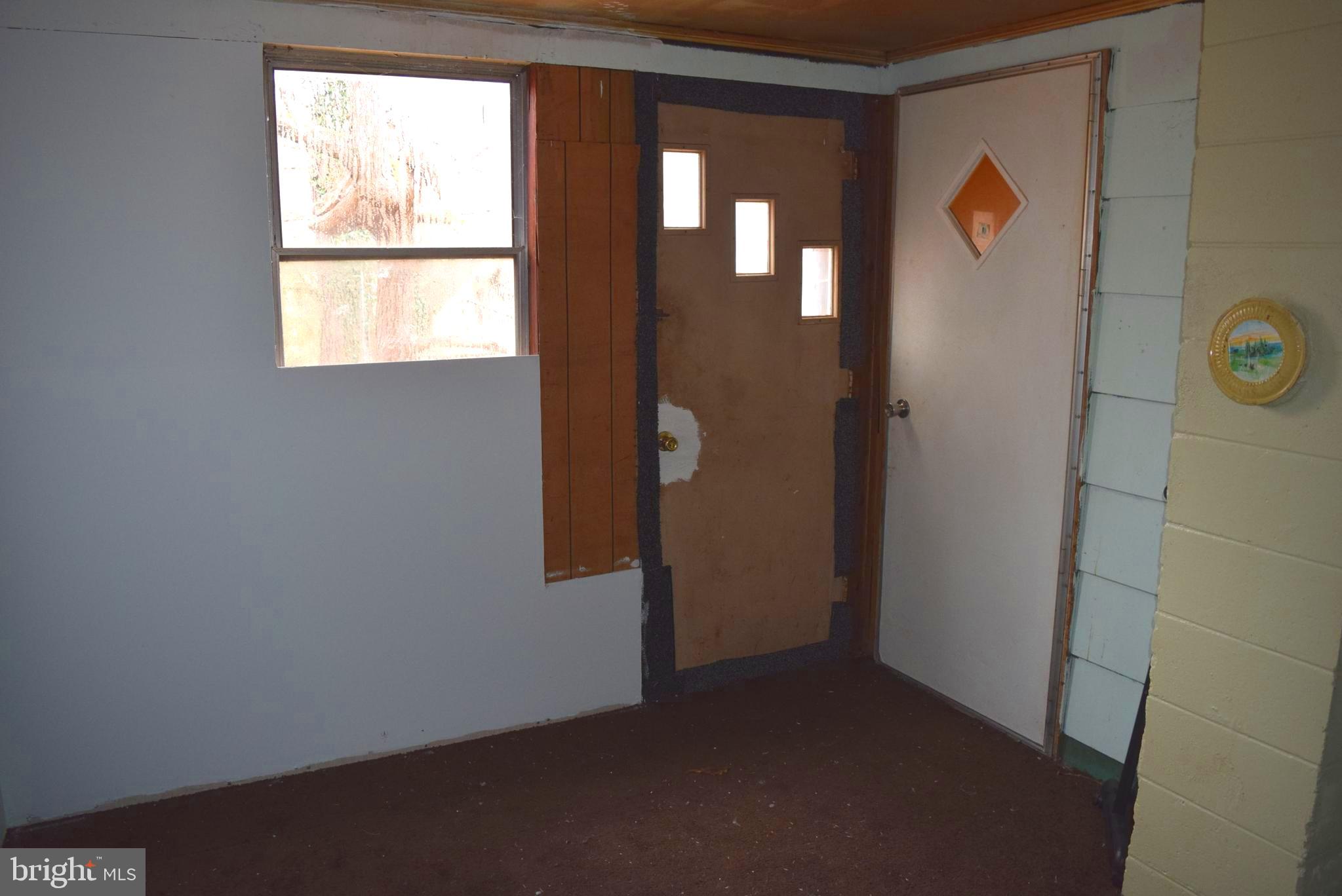 1144 Jackson Road Bumpass, VA 23024 - Photo 41 of 42 Enclosed Porch off Kitchen