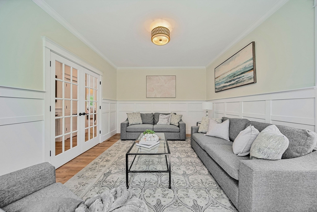 120 Lawton Road Needham, MA 02492 - Photo 13 of 34 a living room with furniture and a rug