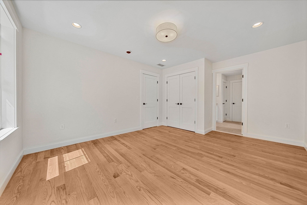 120 Lawton Road Needham, MA 02492 - Photo 20 of 34 a view of empty room with wooden floor