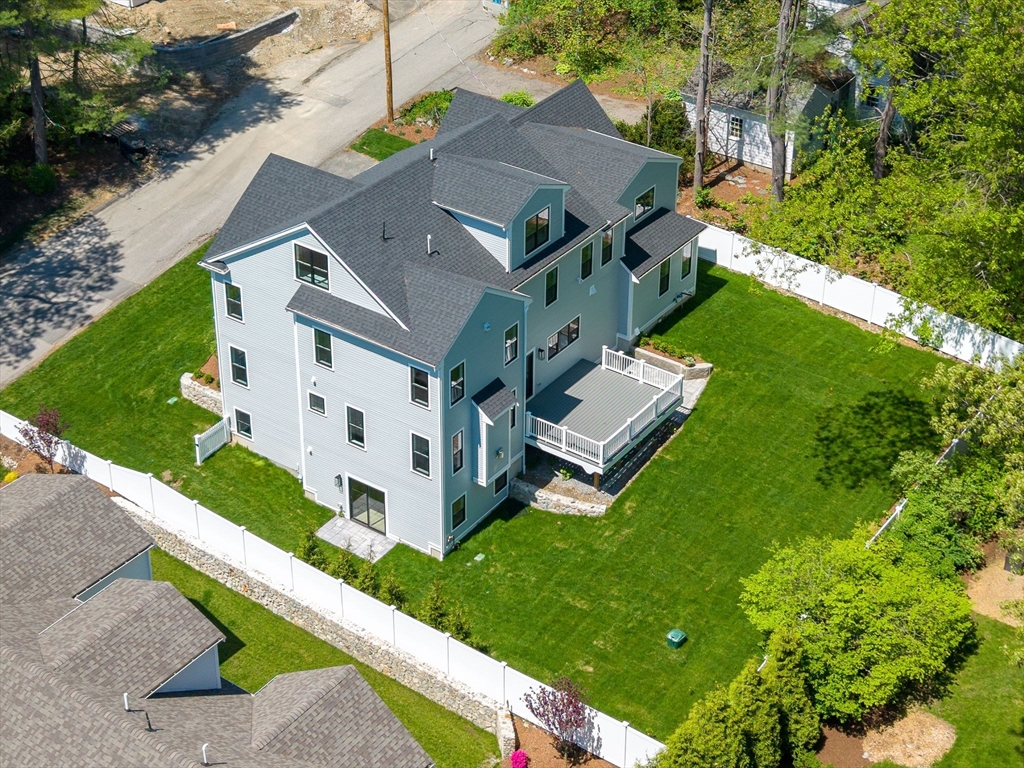 120 Lawton Road Needham, MA 02492 - Photo 2 of 34 an aerial view of residential houses with yard