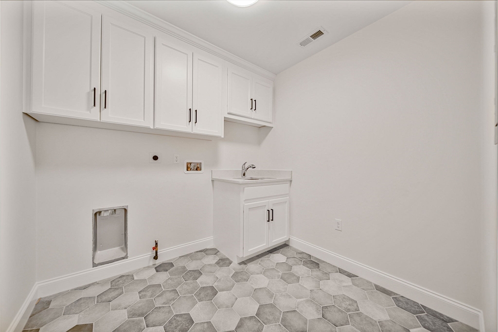 120 Lawton Road Needham, MA 02492 - Photo 24 of 34 a view of kitchen with white cabinets
