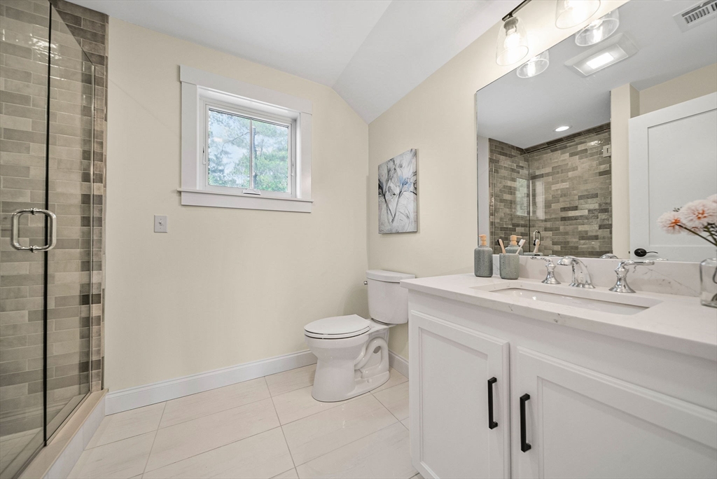 120 Lawton Road Needham, MA 02492 - Photo 27 of 34 a bathroom with a toilet sink and mirror