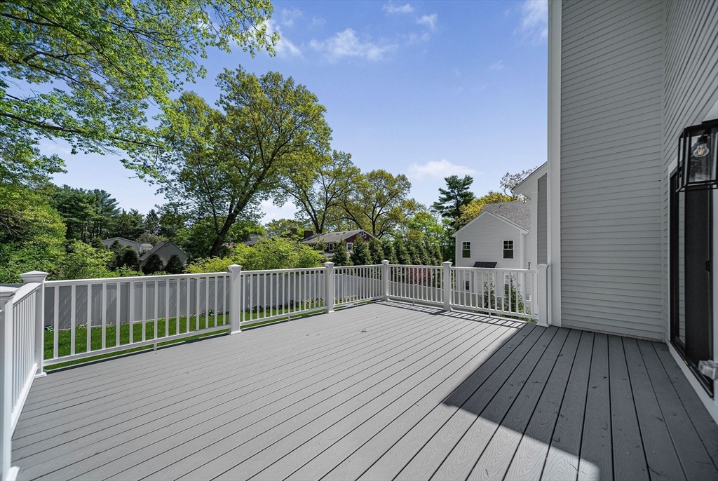 120 Lawton Road Needham, MA 02492 - Photo 30 of 34 a balcony with wooden floor and fence