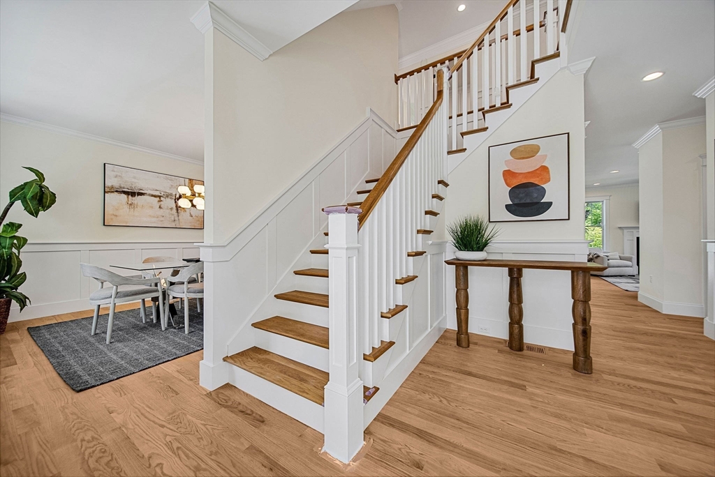 120 Lawton Road Needham, MA 02492 - Photo 3 of 34 a view of entryway dining room and hall with wooden floor