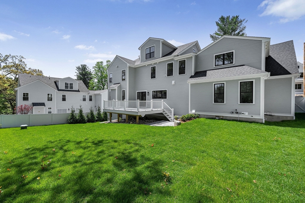 120 Lawton Road Needham, MA 02492 - Photo 31 of 34 a front view of house with yard and green space
