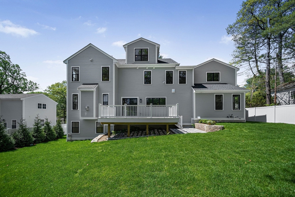 120 Lawton Road Needham, MA 02492 - Photo 32 of 34 a front view of house with yard and green space