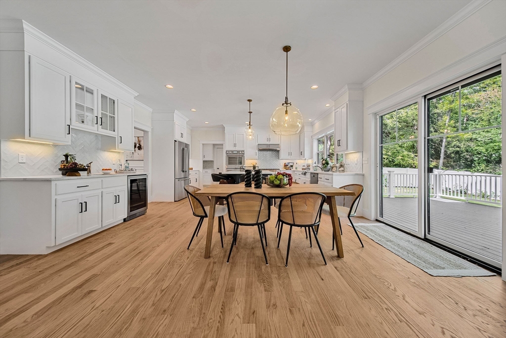 120 Lawton Road Needham, MA 02492 - Photo 8 of 34 a view of a dining room with furniture and wooden floor