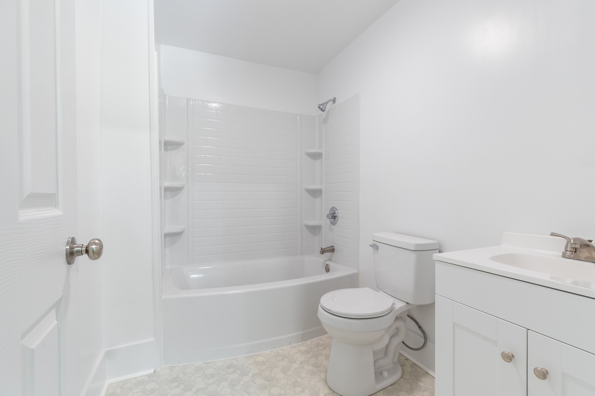 300 West Railroad Street Dickson, TN 37055 - Photo 18 of 58 a bathroom with a toilet sink and shower