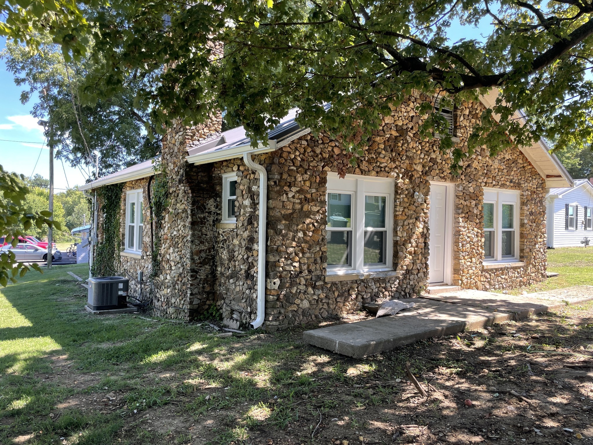 300 West Railroad Street Dickson, TN 37055 - Photo 34 of 58 a front view of a house with garden