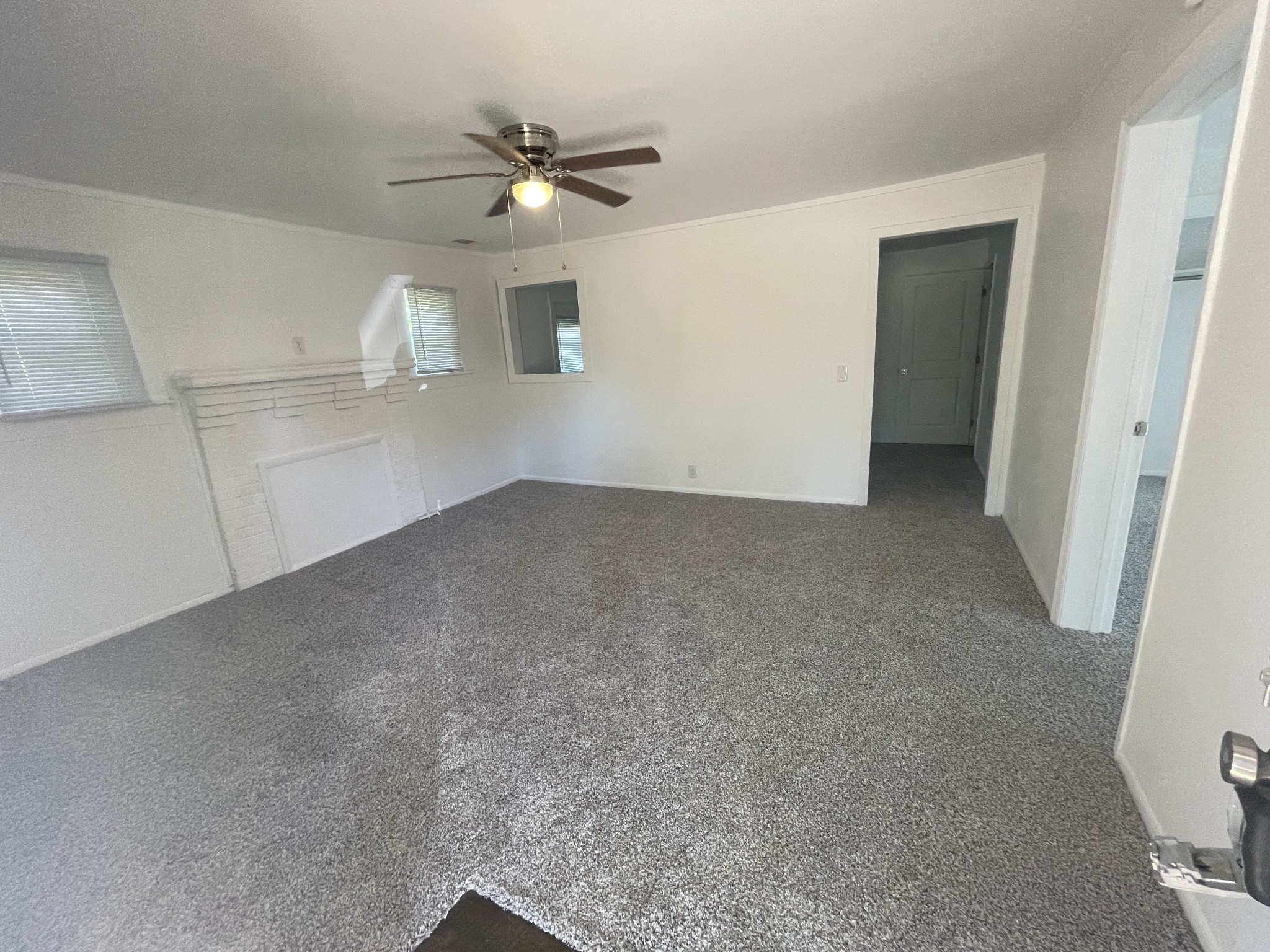 300 West Railroad Street Dickson, TN 37055 - Photo 35 of 58 a view of an empty room with a ceiling fan