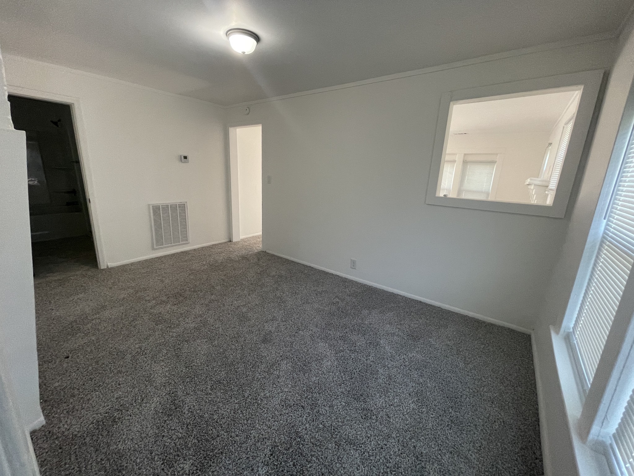 300 West Railroad Street Dickson, TN 37055 - Photo 37 of 58 an empty room with windows