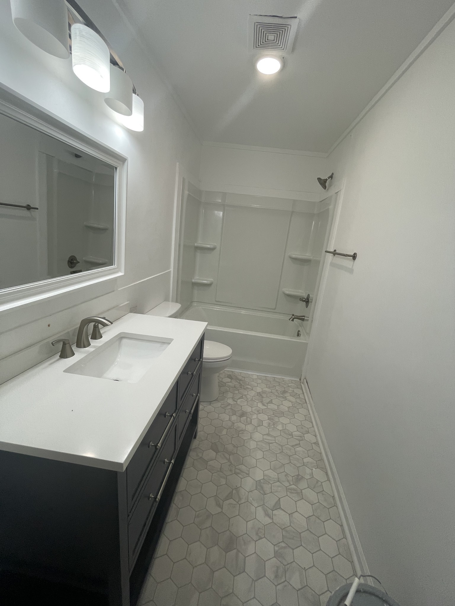 300 West Railroad Street Dickson, TN 37055 - Photo 39 of 58 a bathroom with a sink a vanity and a mirror