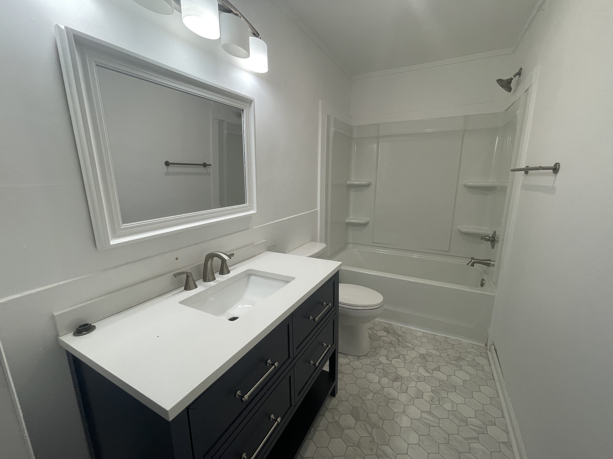 300 West Railroad Street Dickson, TN 37055 - Photo 40 of 58 a bathroom with a sink a toilet and shower