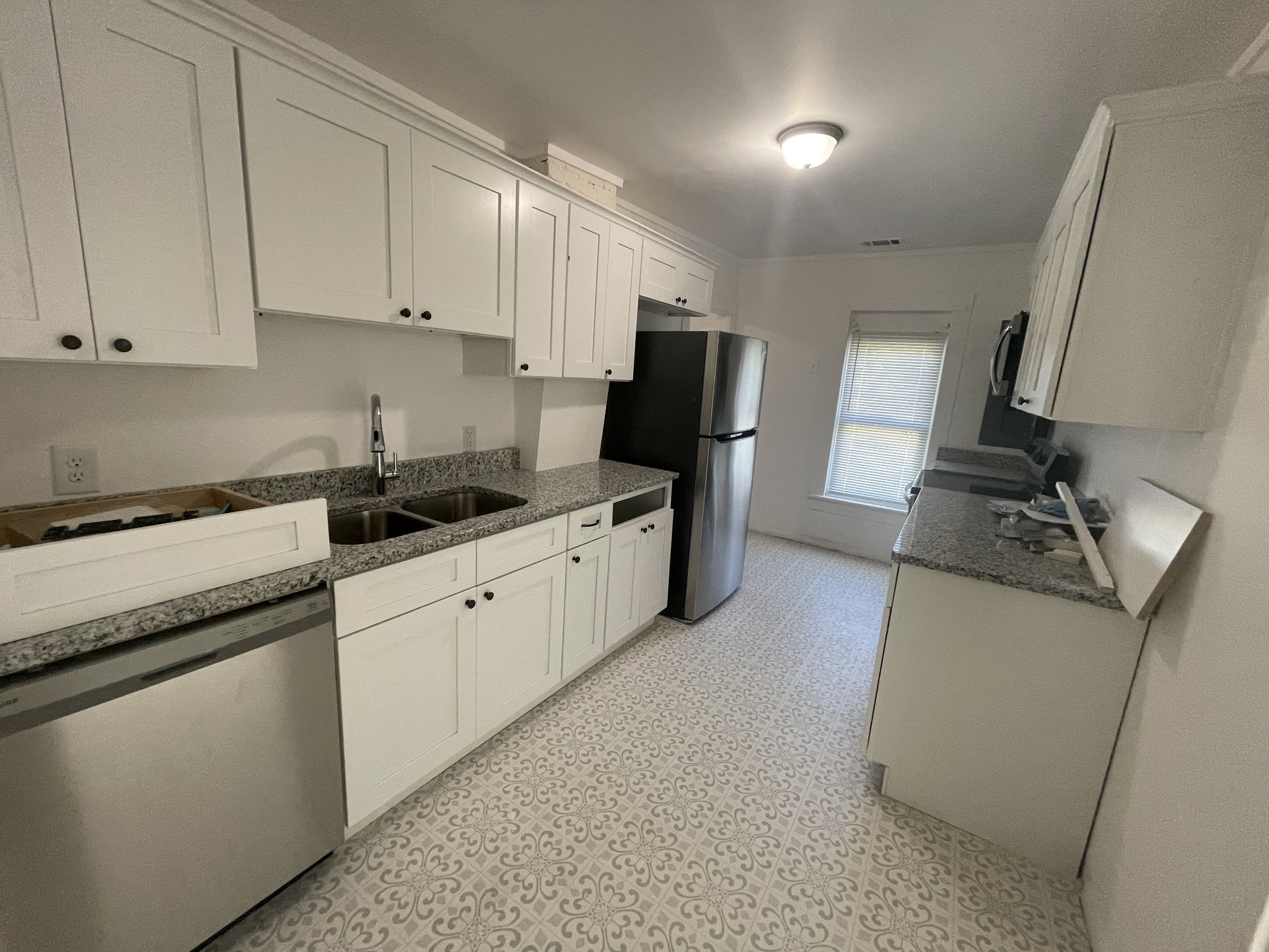 300 West Railroad Street Dickson, TN 37055 - Photo 42 of 58 a kitchen with sink cabinets and appliances