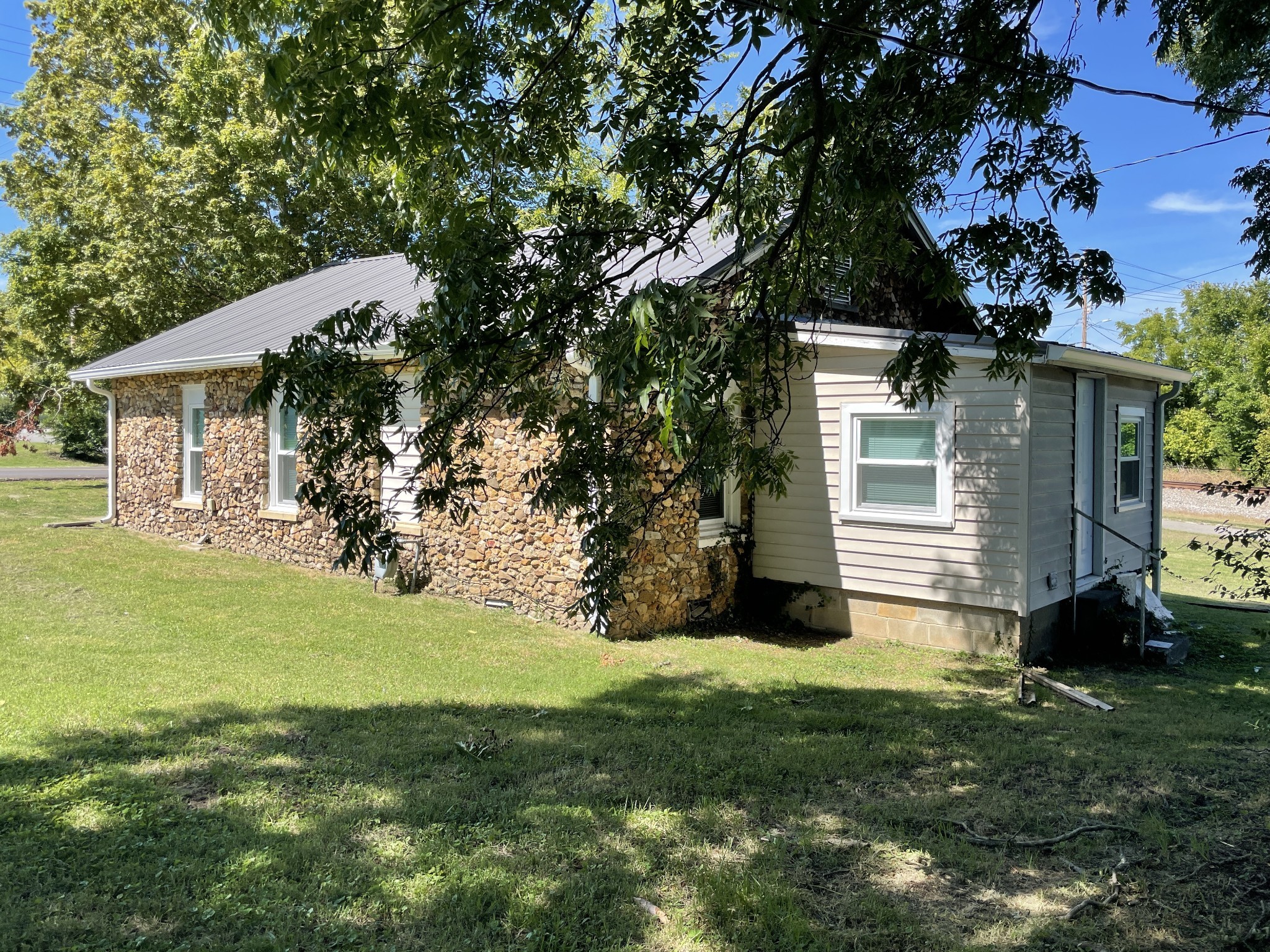300 West Railroad Street Dickson, TN 37055 - Photo 47 of 58 a view of a house with a yard