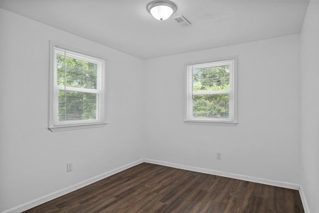 300 West Railroad Street Dickson, TN 37055 - Photo 55 of 58 an empty room with wooden floor and windows