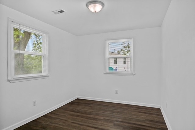 300 West Railroad Street Dickson, TN 37055 - Photo 56 of 58 an empty room with wooden floor and windows