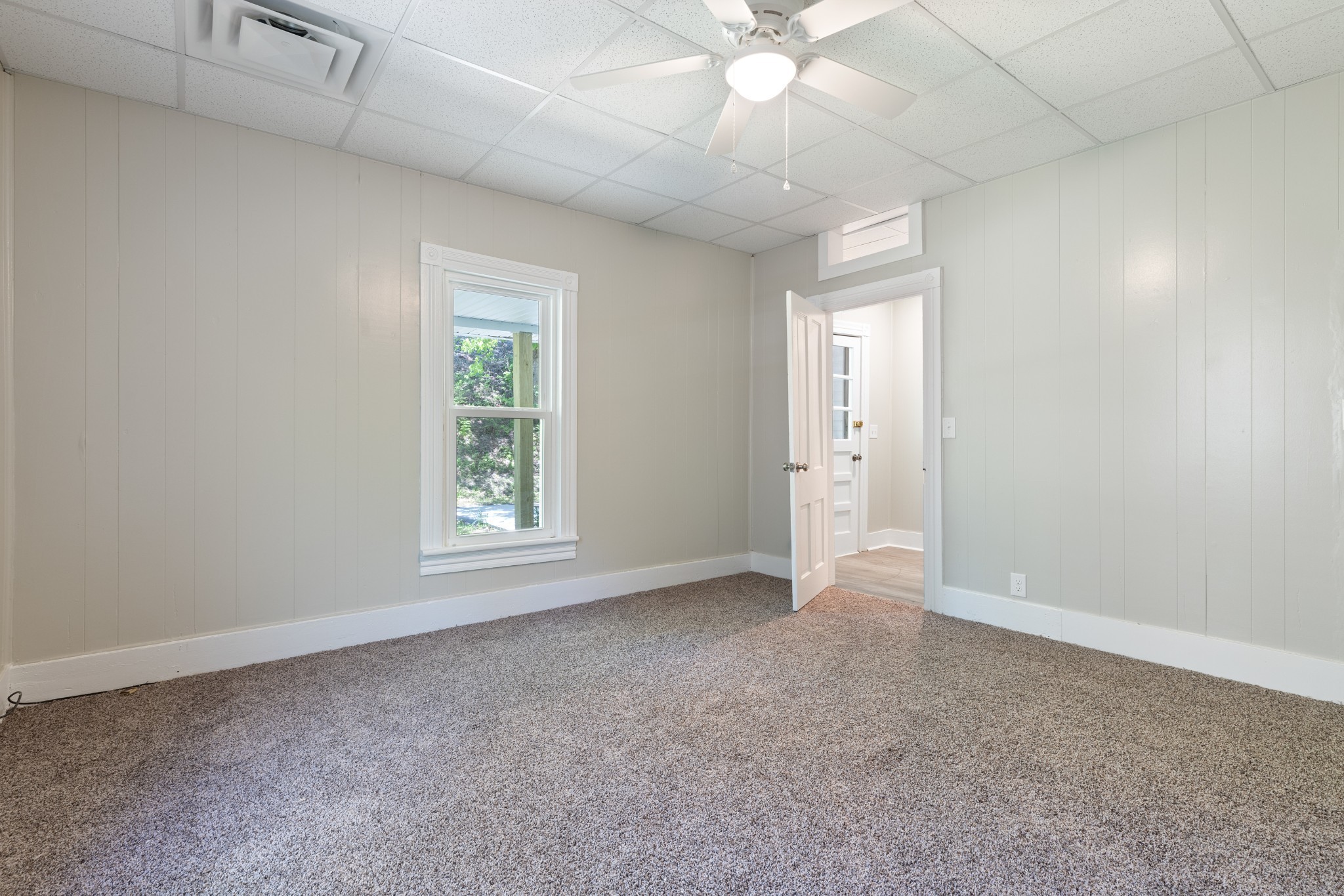 300 West Railroad Street Dickson, TN 37055 - Photo 7 of 58 a view of an empty room with a window