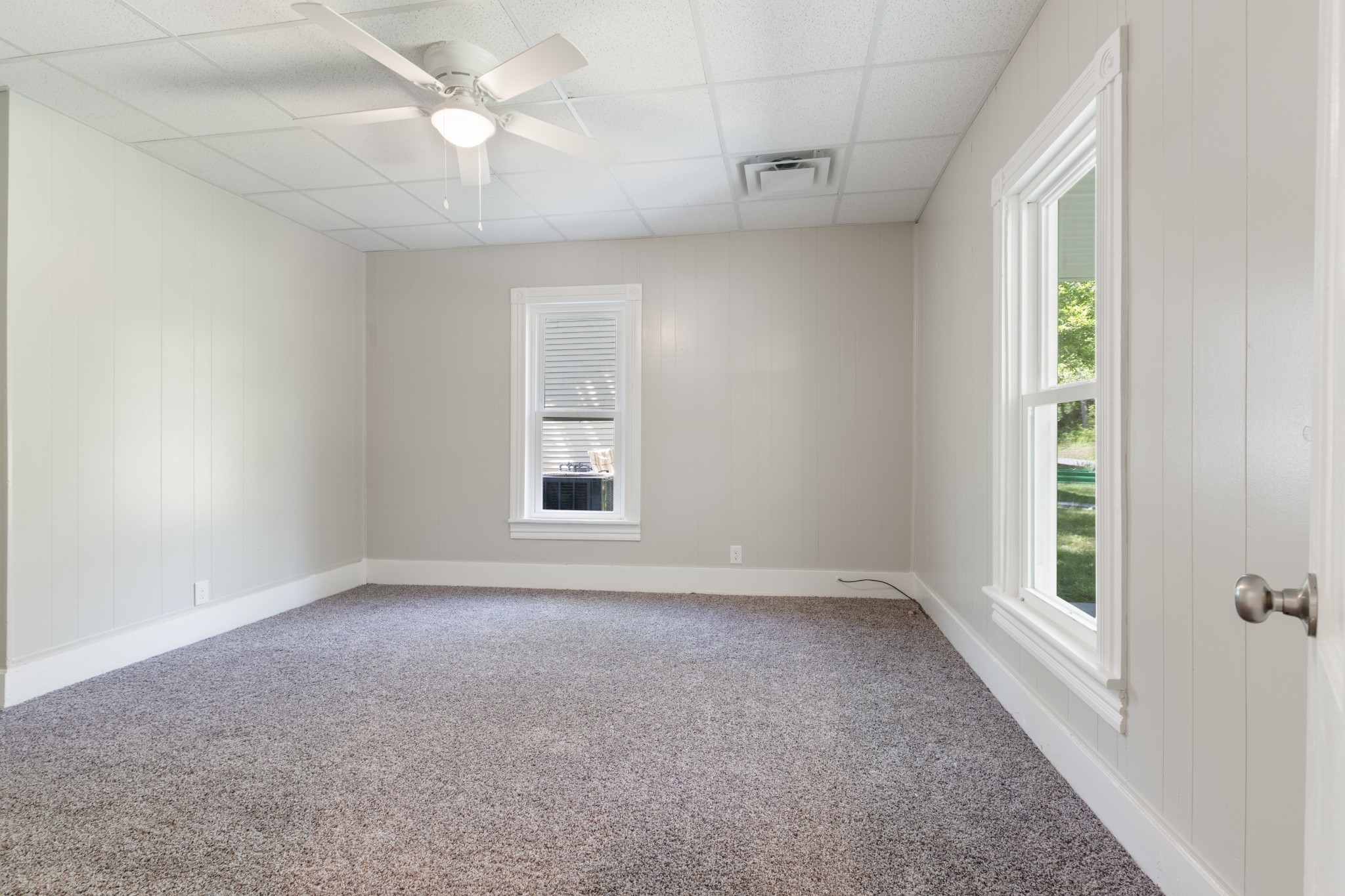 300 West Railroad Street Dickson, TN 37055 - Photo 8 of 58 an empty room with windows and fan