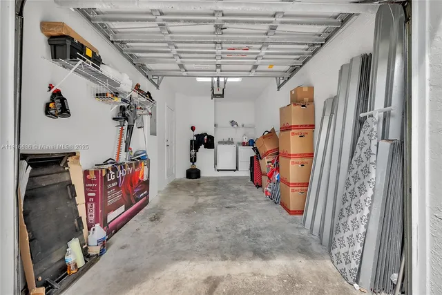 a view of a house with a backyard porch and sitting area
