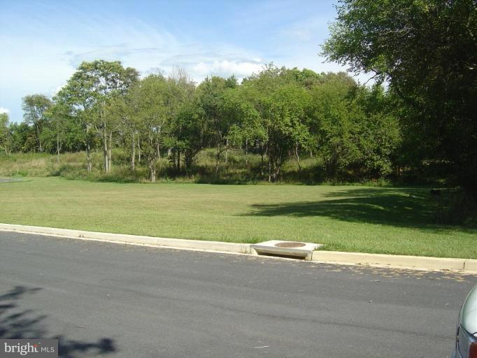 Engle Molers Road Shepherdstown, WV 25443 - Photo 3 of 14 a view of a golf course with a lake