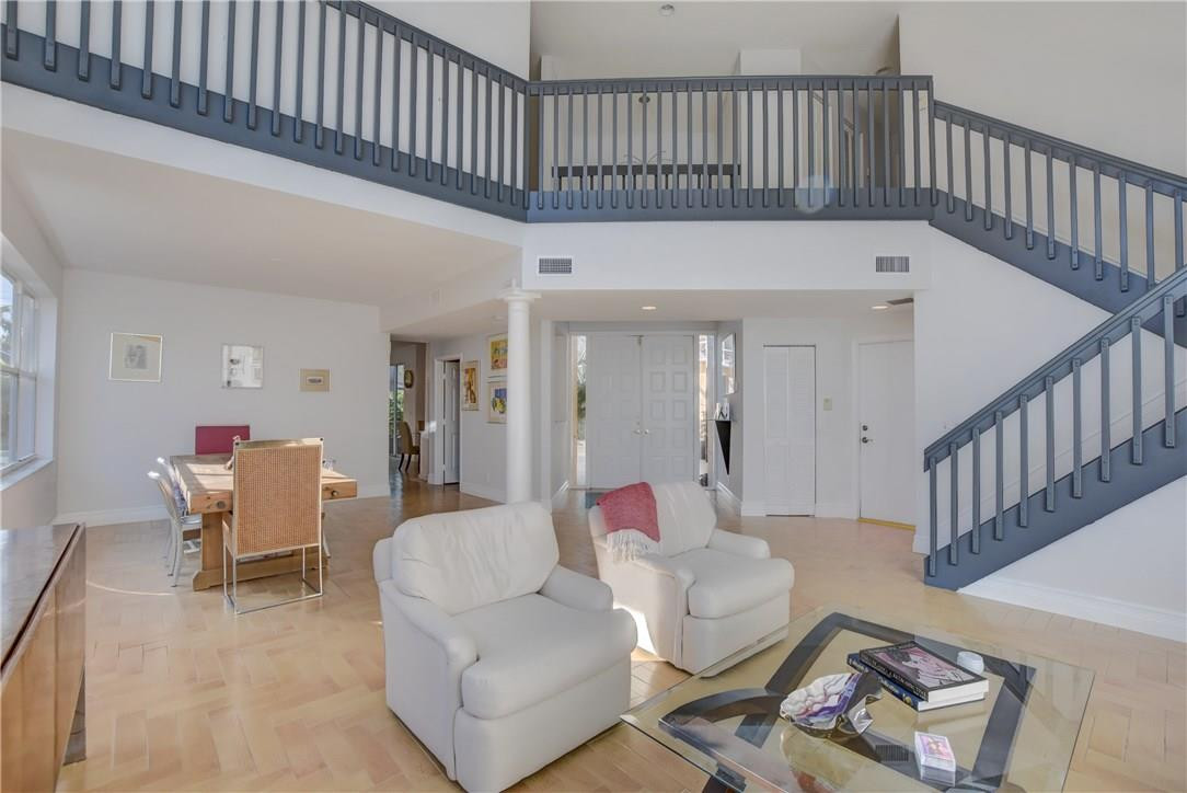 10934 Ravel Court Boca Raton, FL 33498 - Photo 23 of 43 a view of livingroom with furniture and stairs