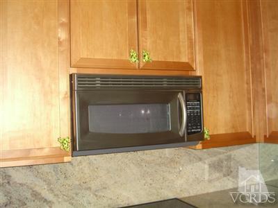 2901 Peninsula Road, Unit 242 Oxnard, CA 93035 - Photo 11 of 30 a close view of fireplace