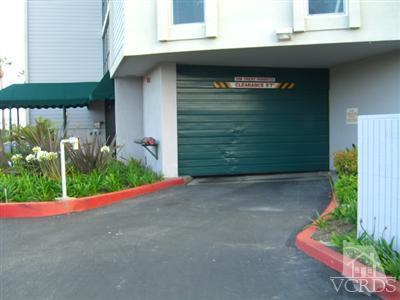 2901 Peninsula Road, Unit 242 Oxnard, CA 93035 - Photo 24 of 30 a couple of potted plants in front of door