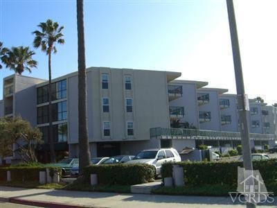 2901 Peninsula Road, Unit 242 Oxnard, CA 93035 - Photo 5 of 30 a front view of a building with garden