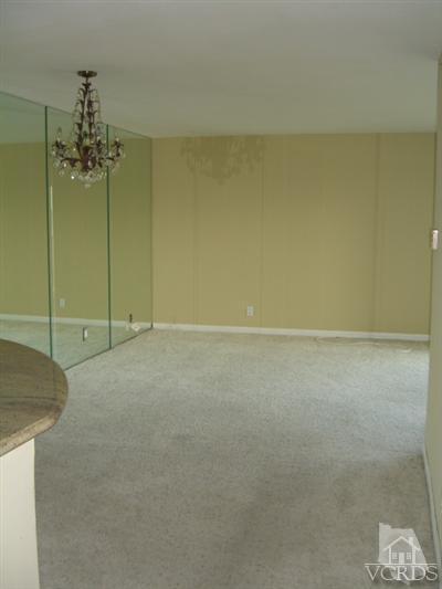 2901 Peninsula Road, Unit 242 Oxnard, CA 93035 - Photo 6 of 30 en empty room with a door