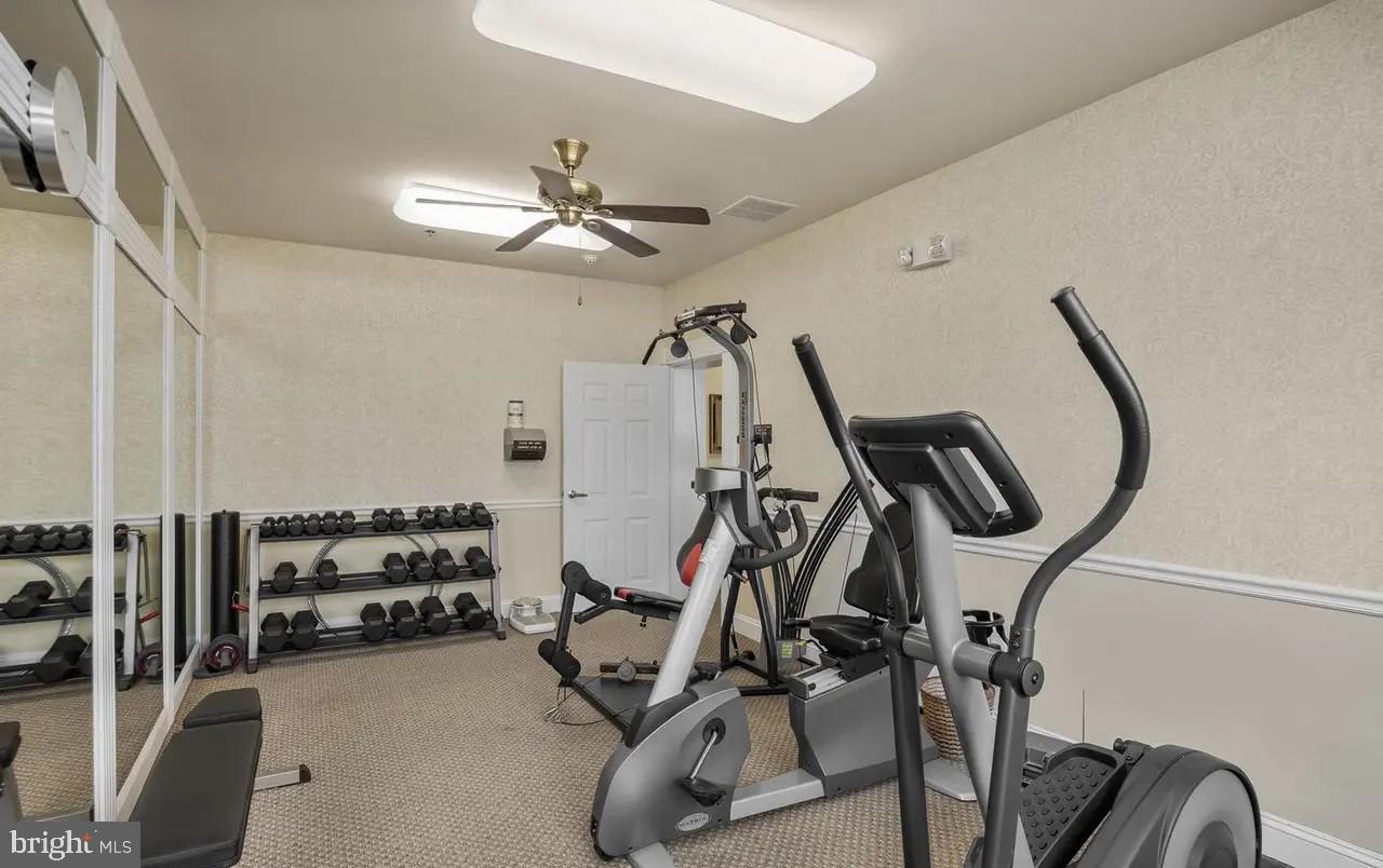 7320 Maple Avenue, Unit 231 Pennsauken, NJ 08109 - Photo 12 of 15 a view of a room with gym equipment
